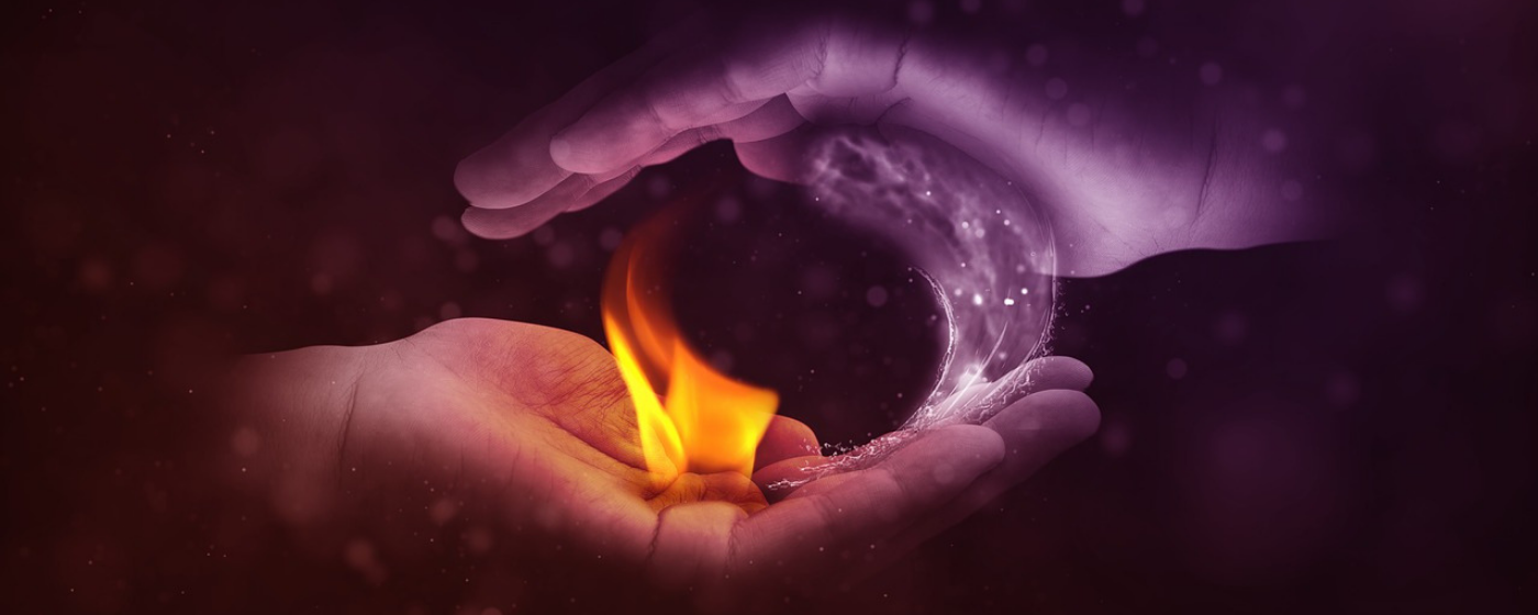 Dueling Dichotomies yin and yang hands with fire and ice